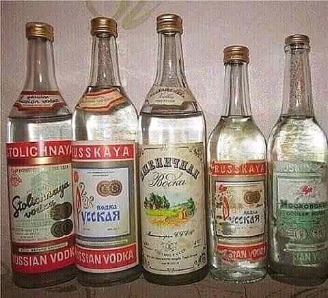 RUSSIAN VODKA on six bottles. Cyrillic labels include Русская водка, Московская, Российская водка, и другие бренды.